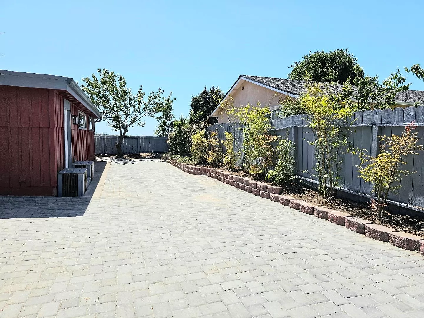 Side yard & long driveway—room for boats/RVs; great gardening space.