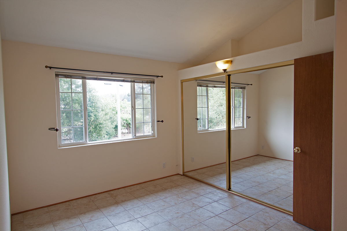 Bedroom with huge closet, overhead storage, plus walk-in.