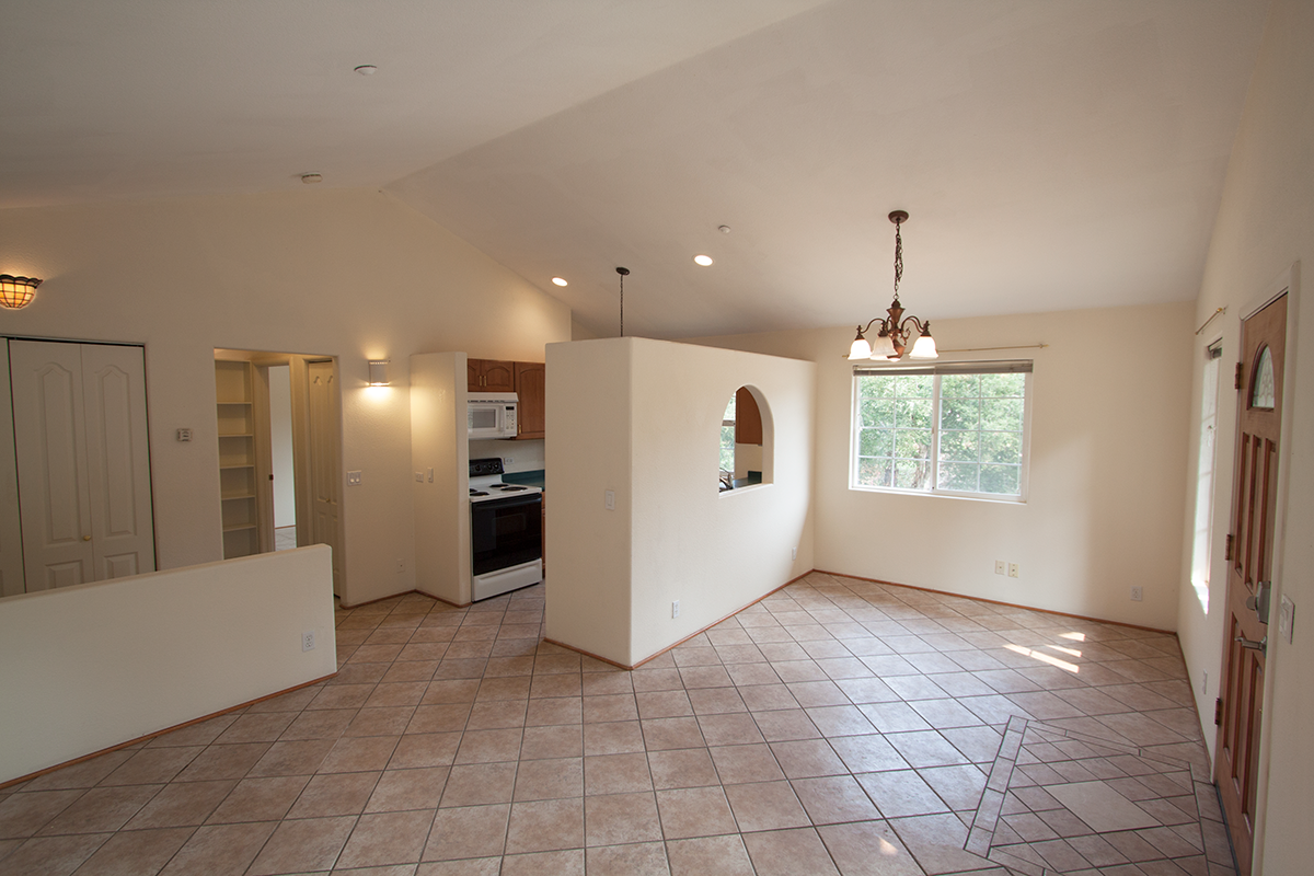 Open plan with space for dining or office—great views.