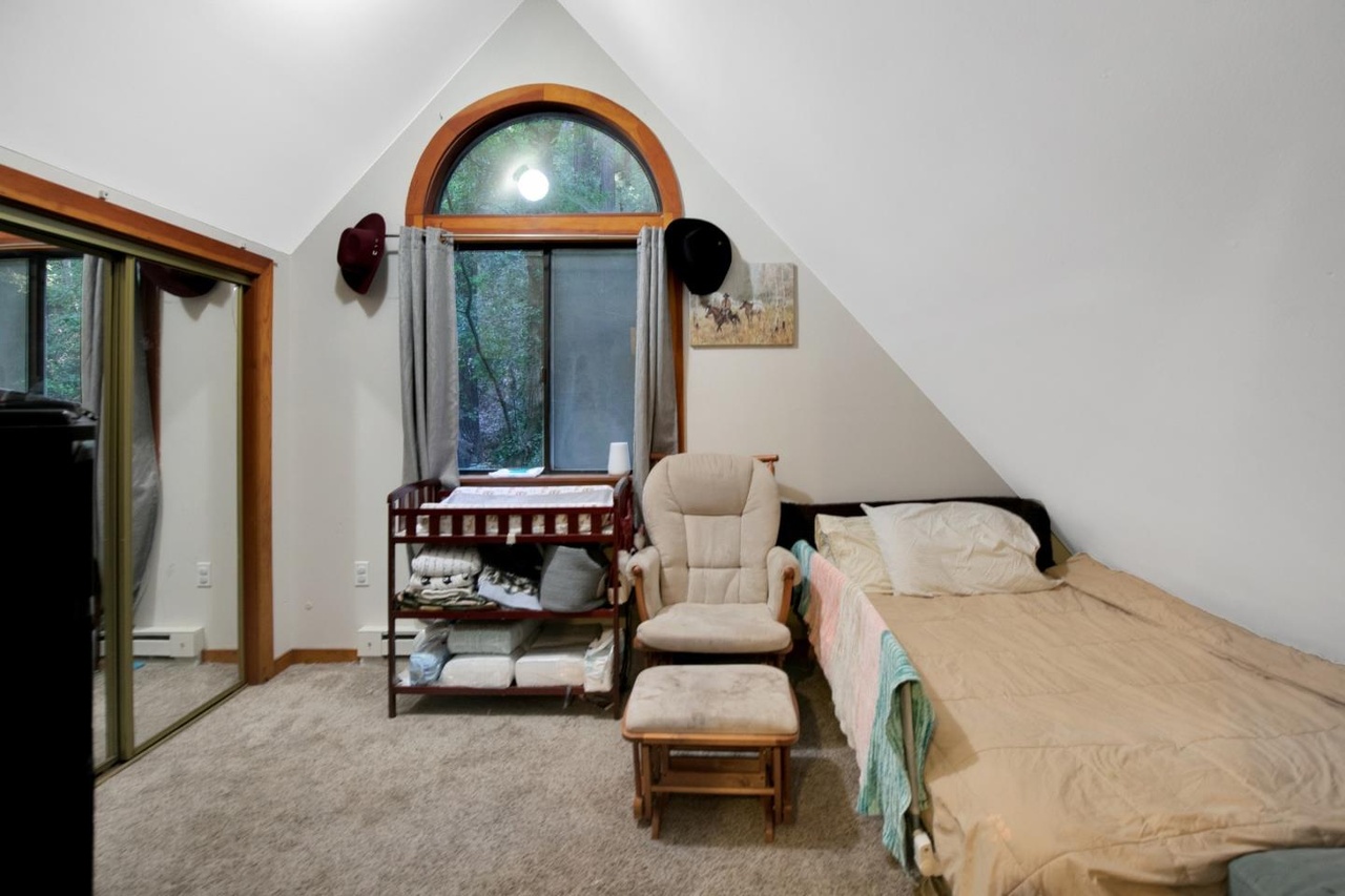 Bedroom with views of creek and park.