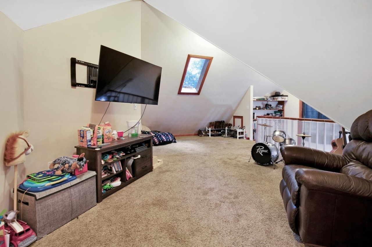 Upstairs living room—sunny and bright.
