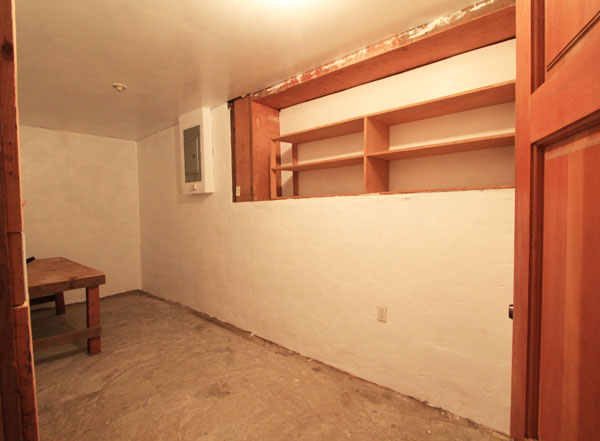 Utility room with furnace & water heater; lots of storage.