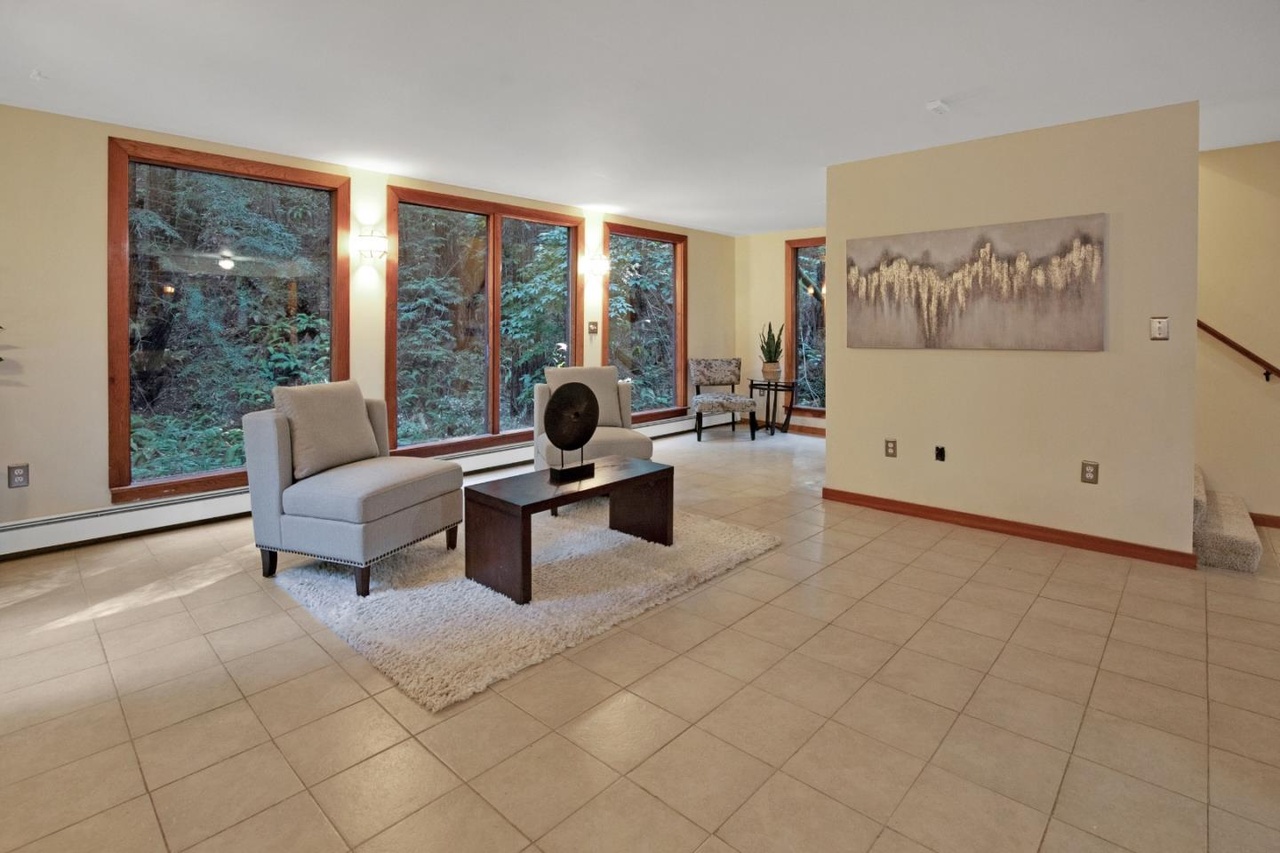 Entry view: kitchen left; laundry & bath right.