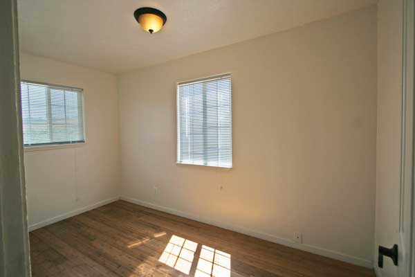 Third bedroom with bamboo flooring.