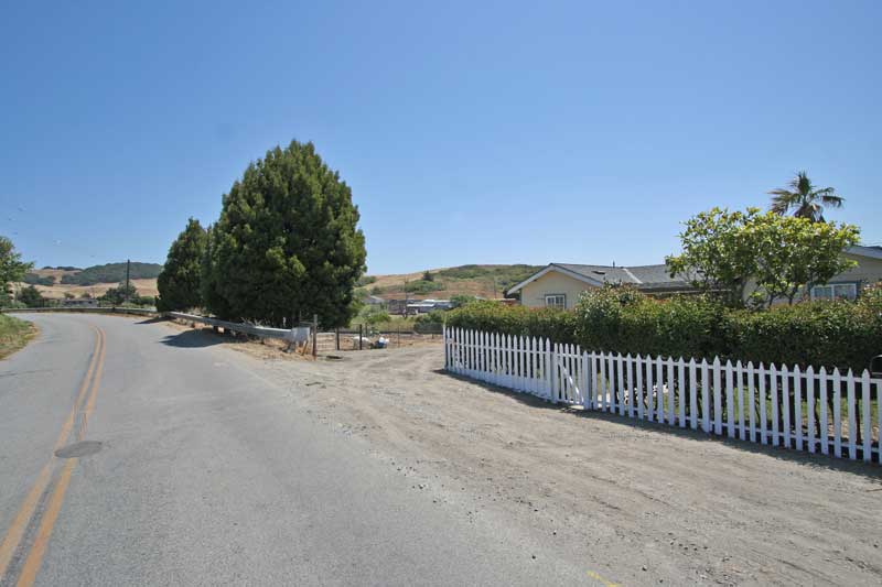 Quiet dead-end street in a country setting.