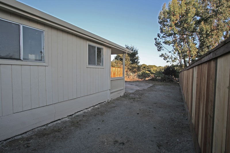Large gated parking area with ample storage space.