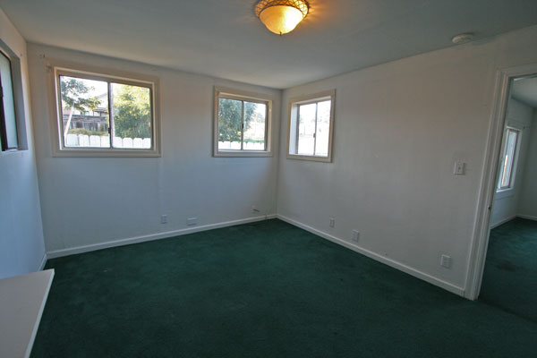 Second bedroom—large, with ample closet space.