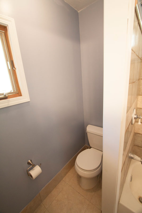 Toilet room at end of bath.