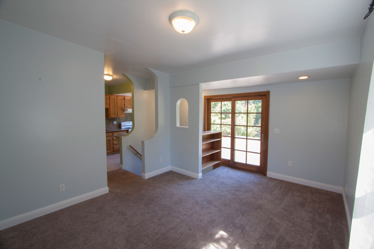 Kitchen and second full bath at opposite end upstairs.