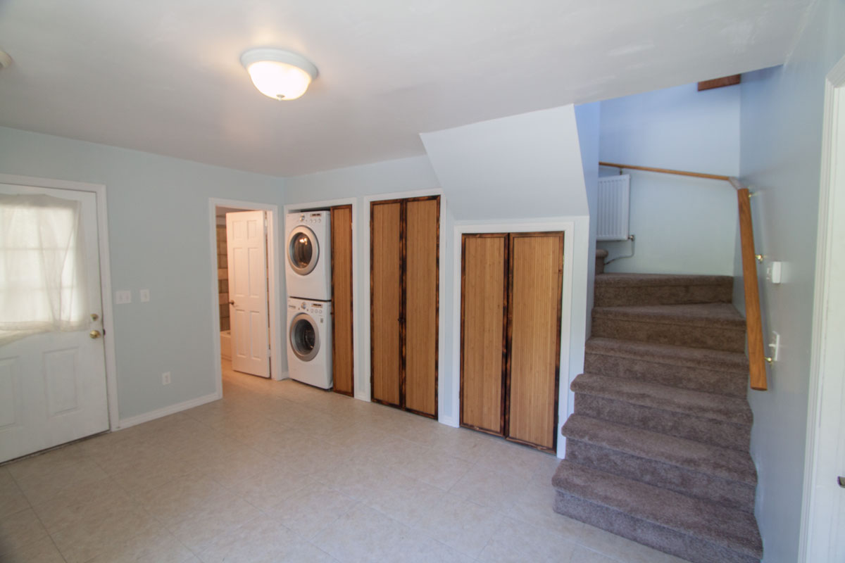 Lower level toward bath, washer/dryer, and storage.