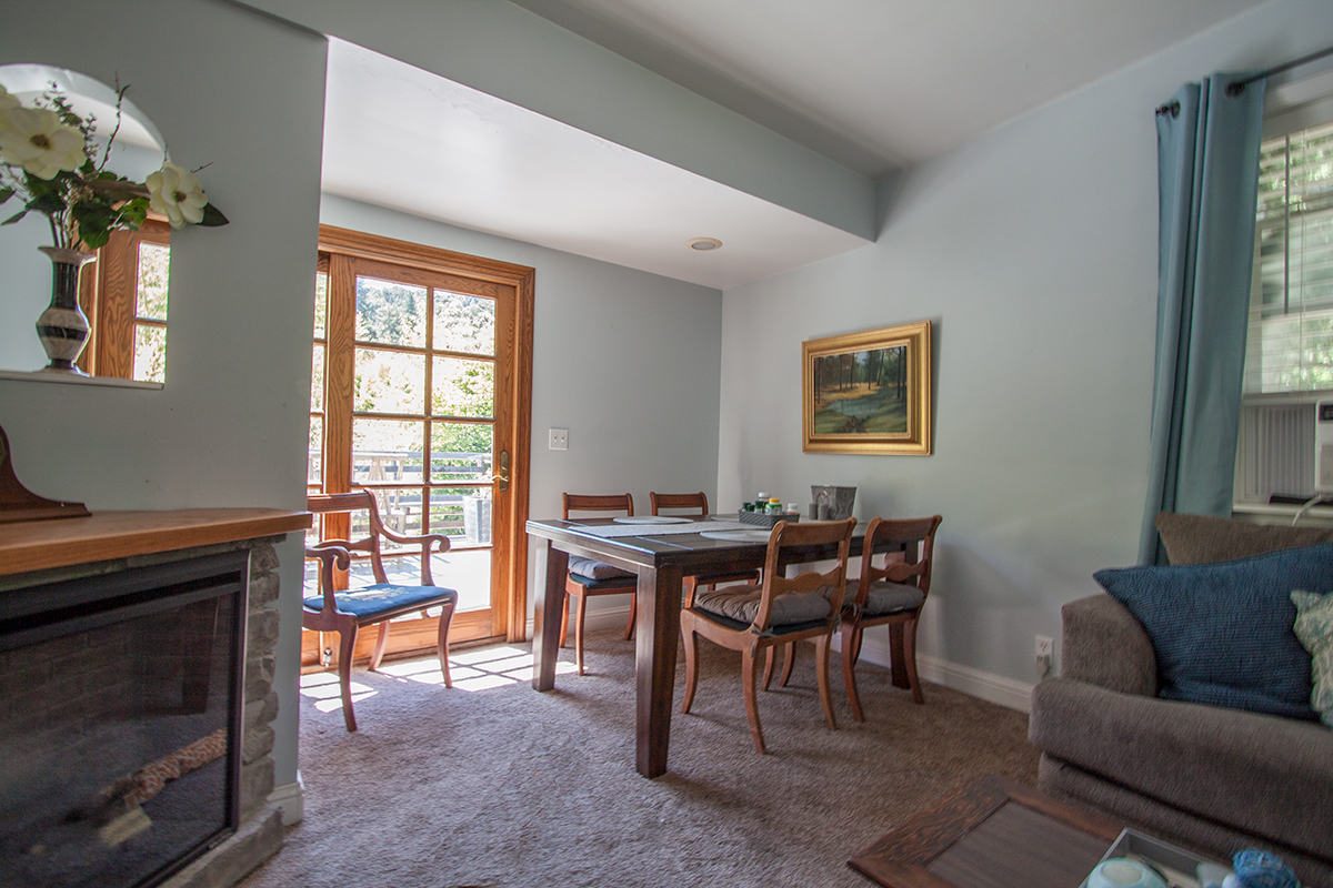 Upstairs living/dining with door to deck.