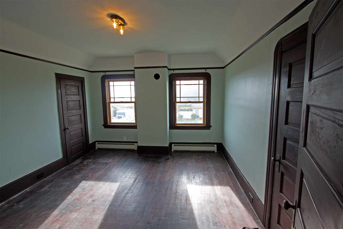Front bedroom ~12.5×14 with two closets.