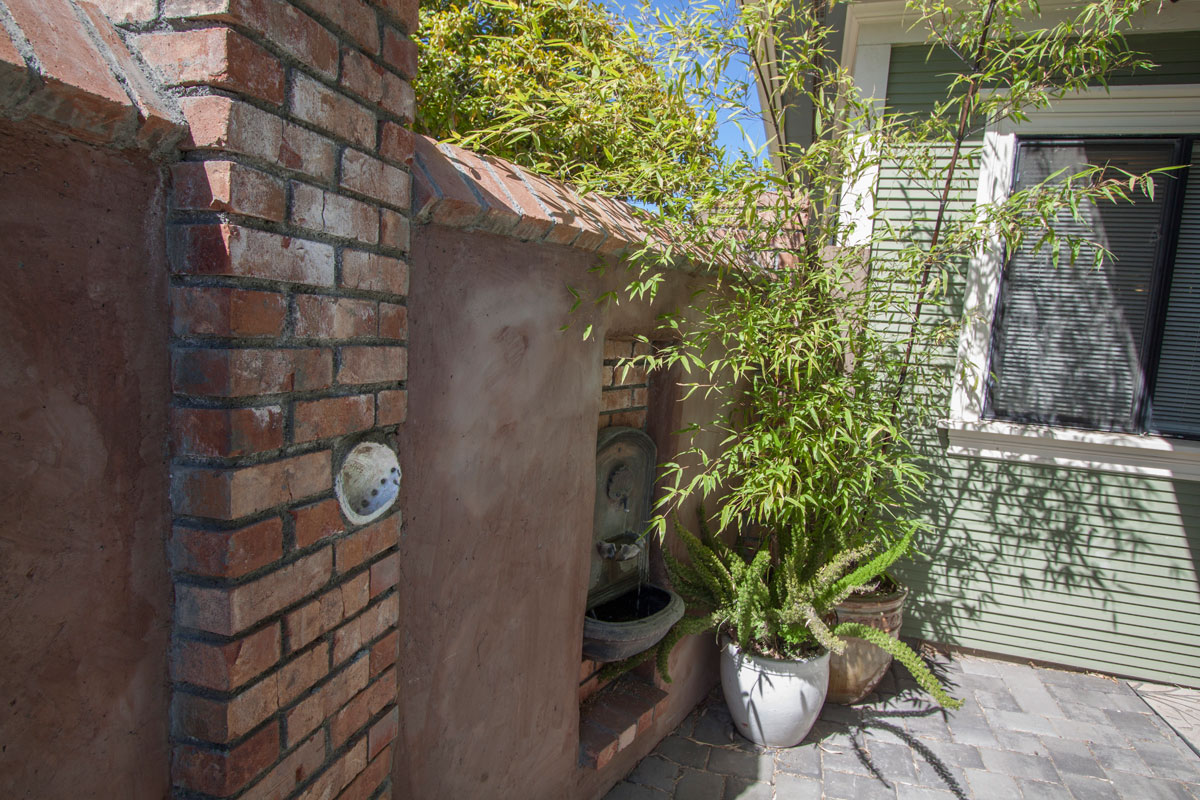 Fountain at the end of the courtyard by the front door.