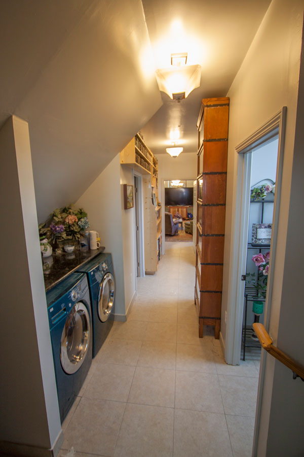 Start of upstairs master suite—bedroom, laundry, shower & dressing rooms.