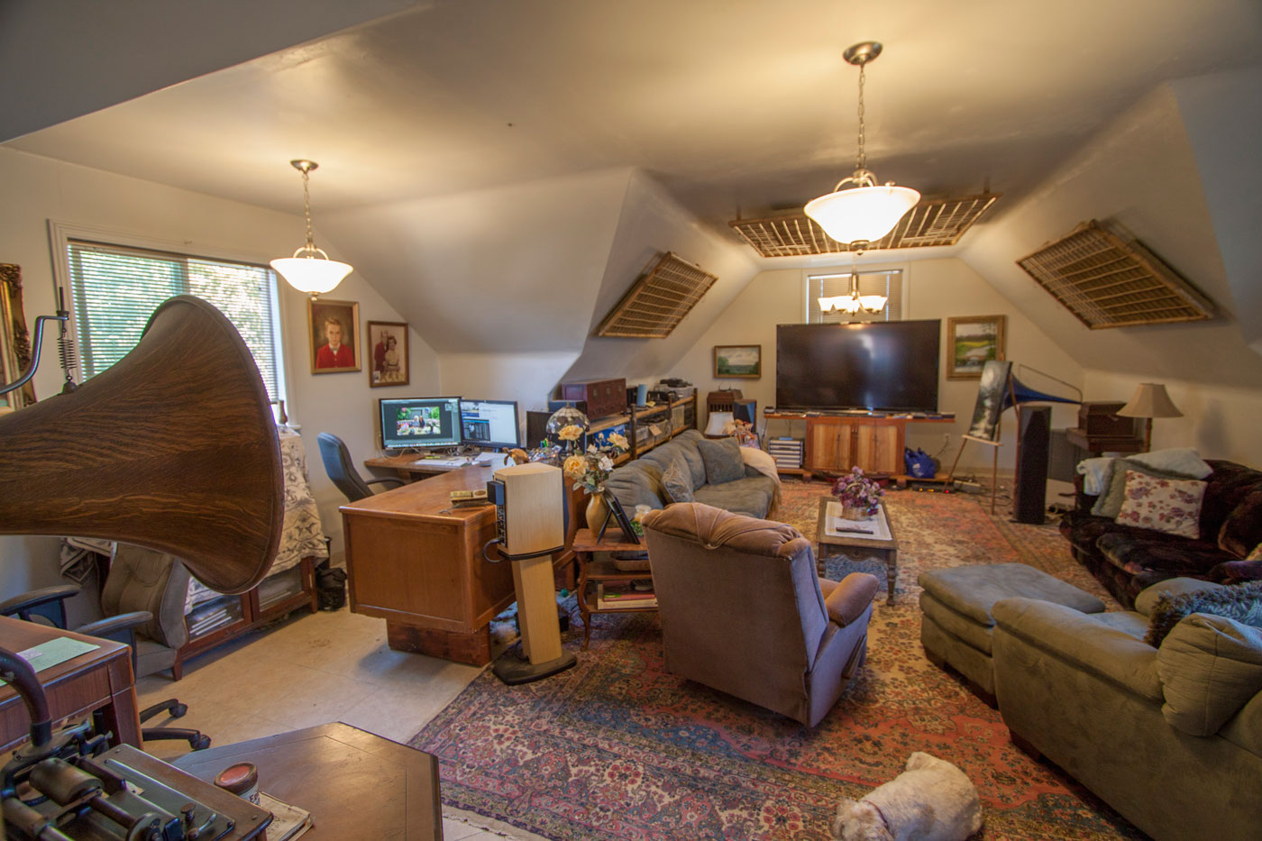 Massive upstairs living/theater space ~23×29—view from door.