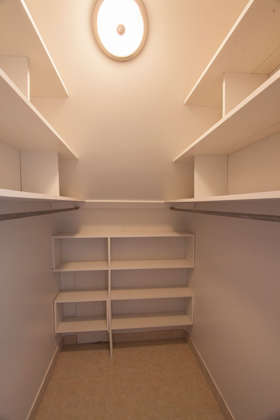 Smaller of the two master closets (in bedroom).