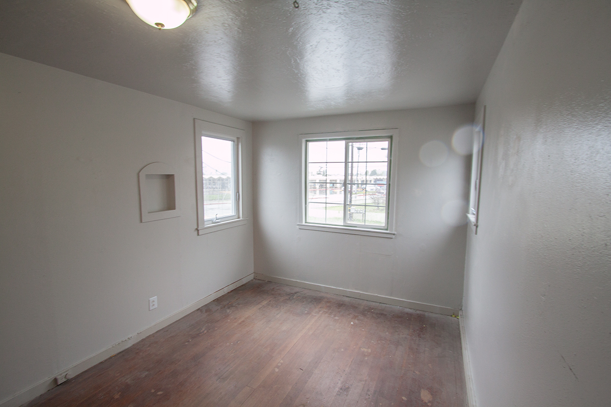 Upstairs bedroom ~10×14 with large closet and views on three sides.