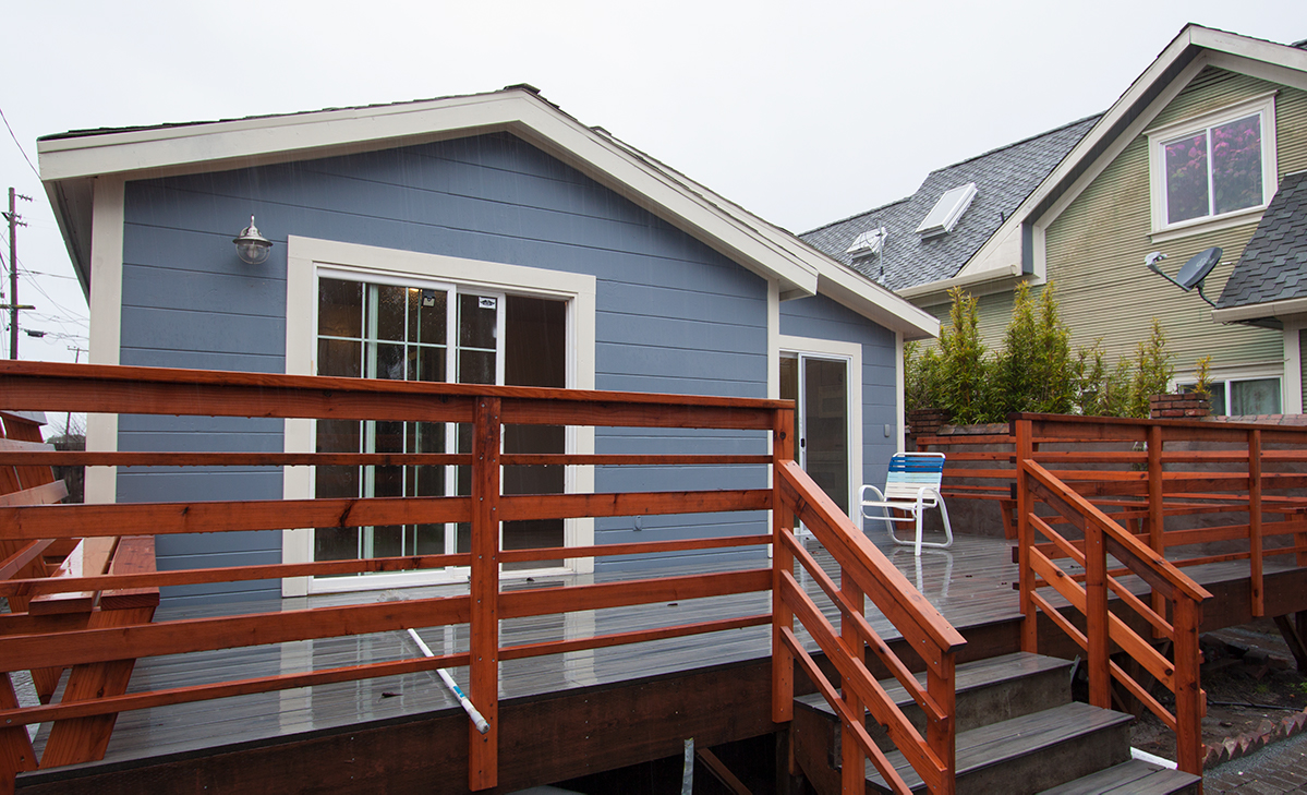 Trex back deck with custom redwood built-in benches.