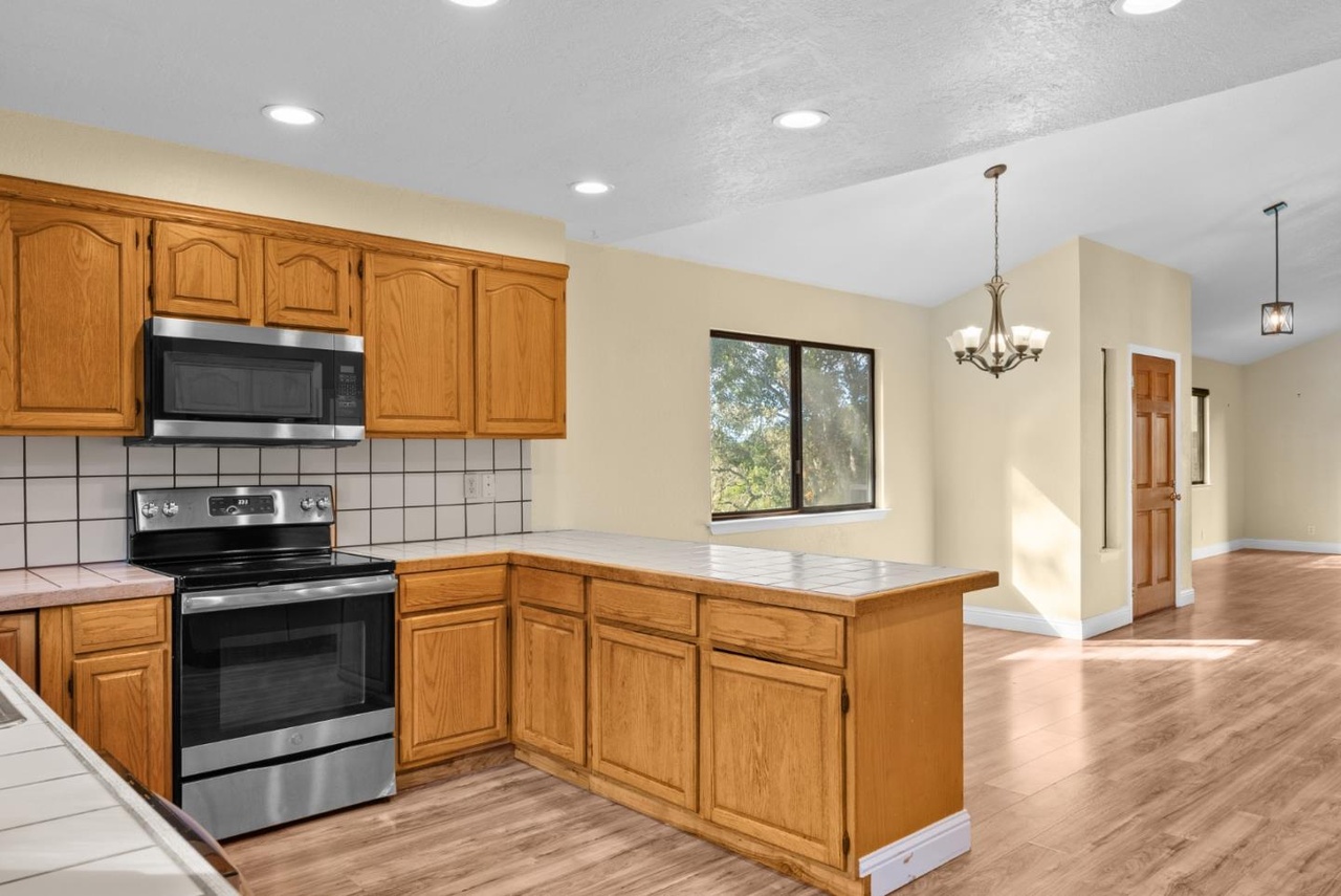 Open plan kitchen flows into 12 x 15 dining room. 