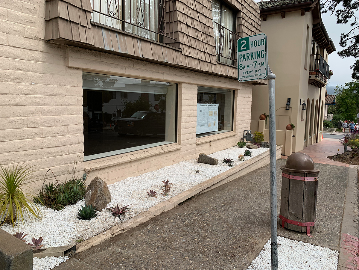 Windows face sidewalk; convenient 2-hour parking.